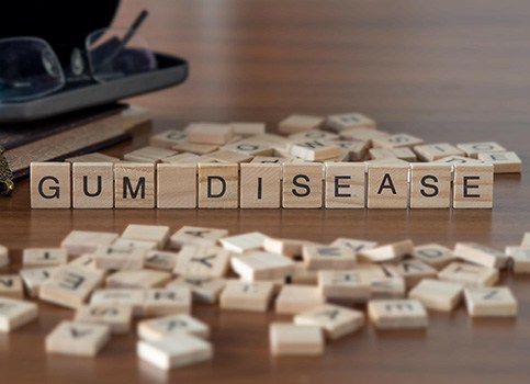 Gum disease written on wooden blocks